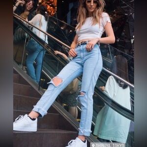 Light wash REVICE DENIM distressed straight jeans